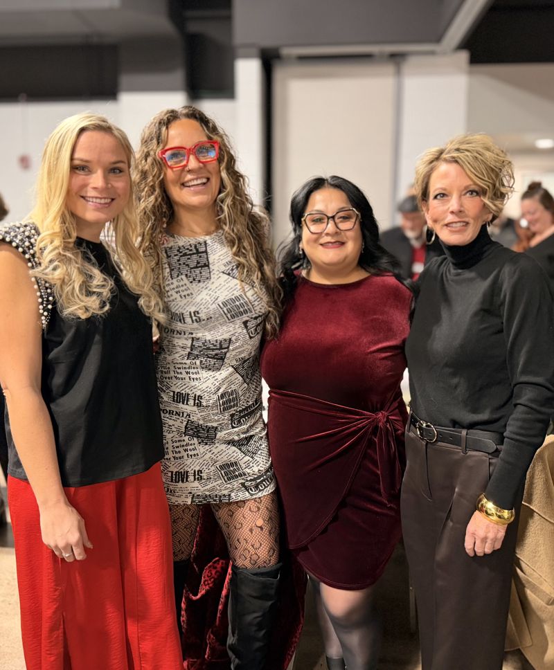 Julia with three women at a networking event